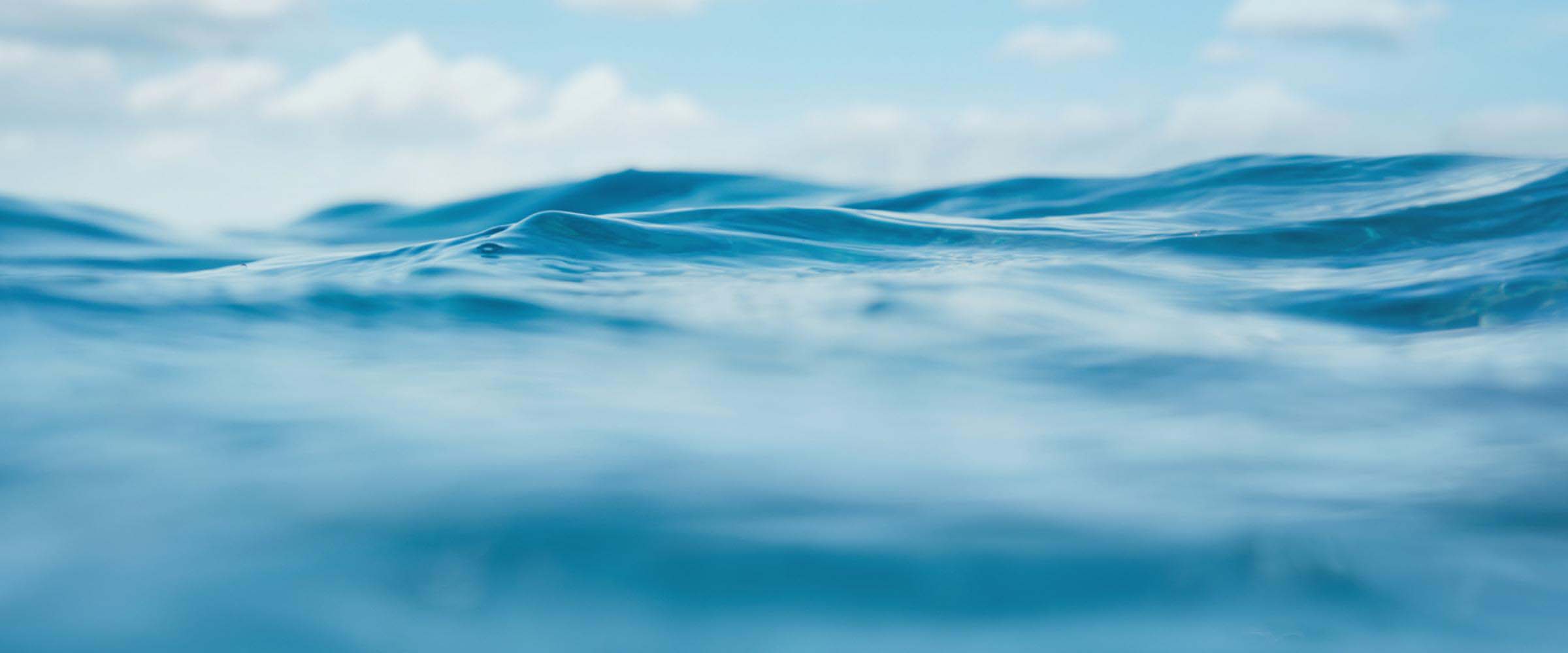 Ocean waves and blue sky.