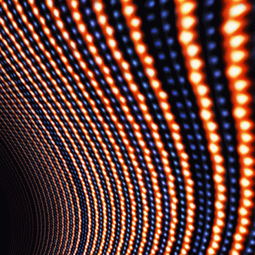 Small orange and blue lights repeated in a wave pattern.