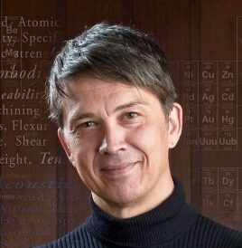 Gerbrand Ceder, a dark-haired person wearing a black turtleneck, poses for a headshot.