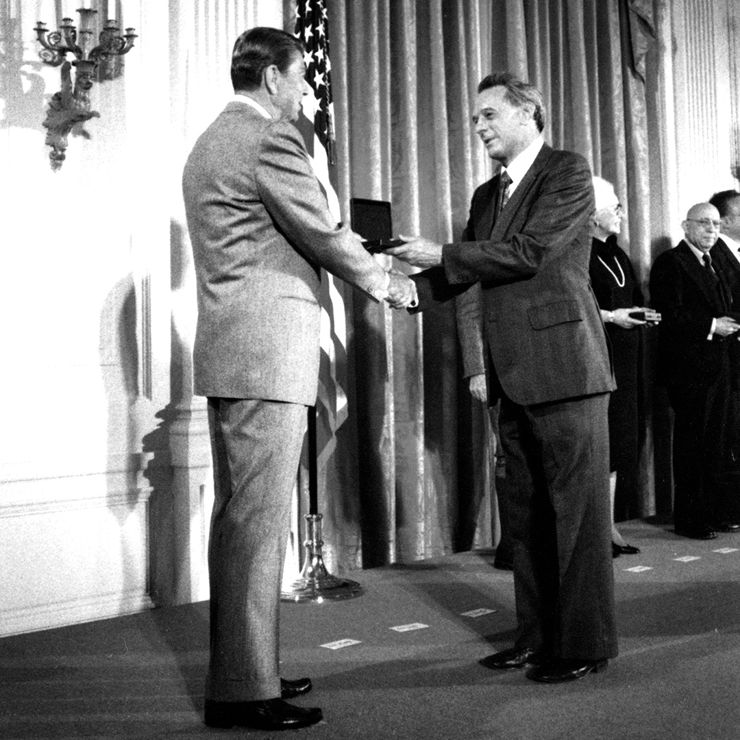 President Ronald Reagan (right) presents the National Medal of Science to George Pimentel (left) at the White House.