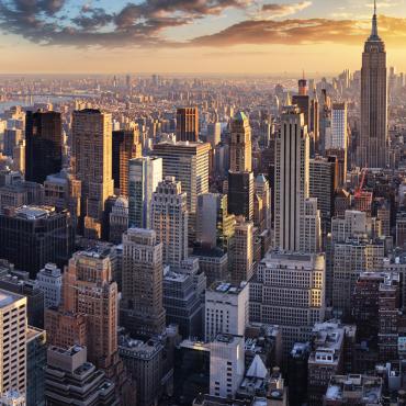 New York skyline against a sunset.