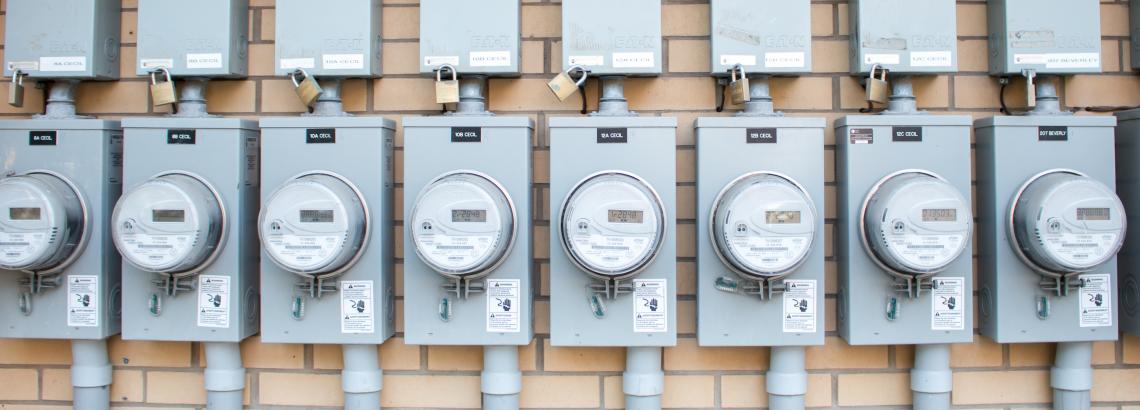 Energy meters lined up in a row.