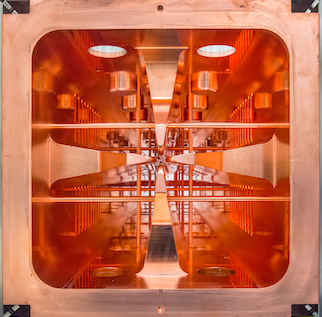 End view of a radiofrequency quadrupole accelerator (RFQ) shows the intricately shaped structures inside the linacs.