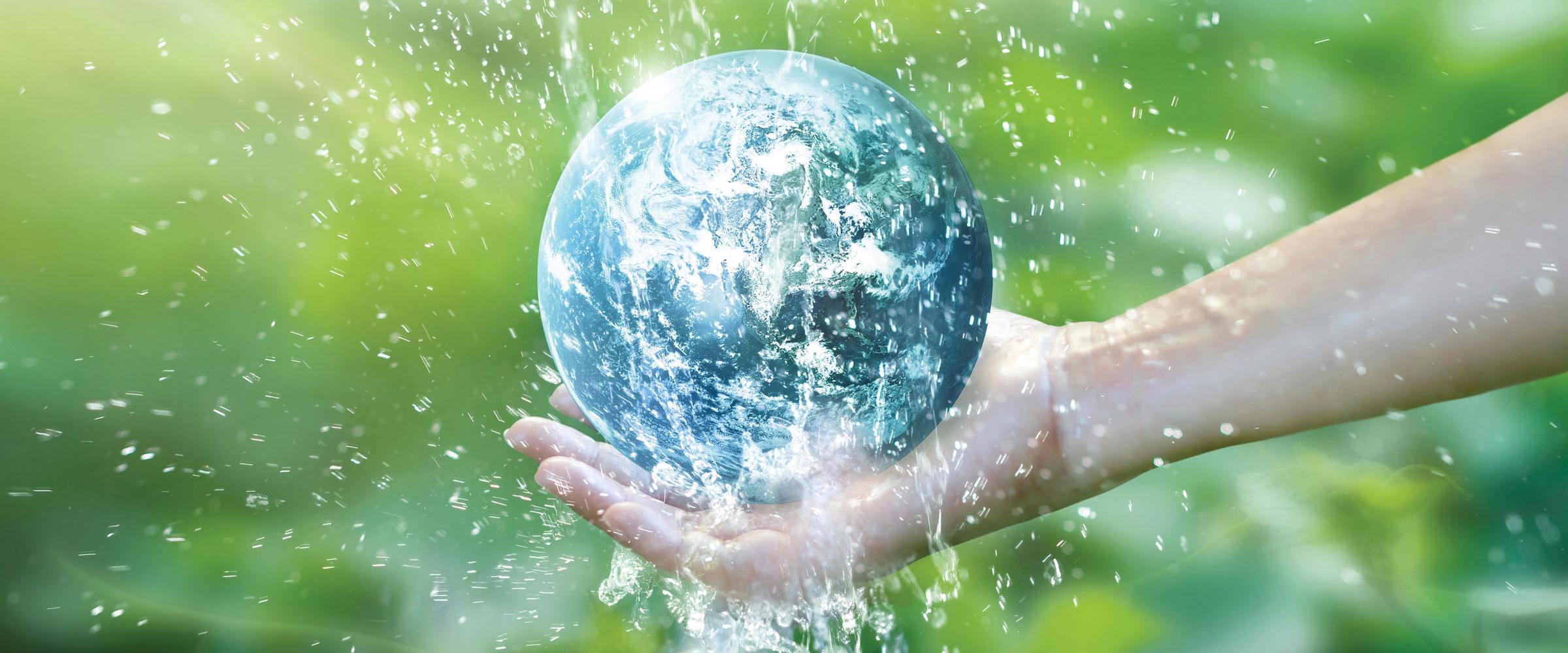 Digital rendering of an outstretch arm holding a softball-sized Earth with splashing water around the frame