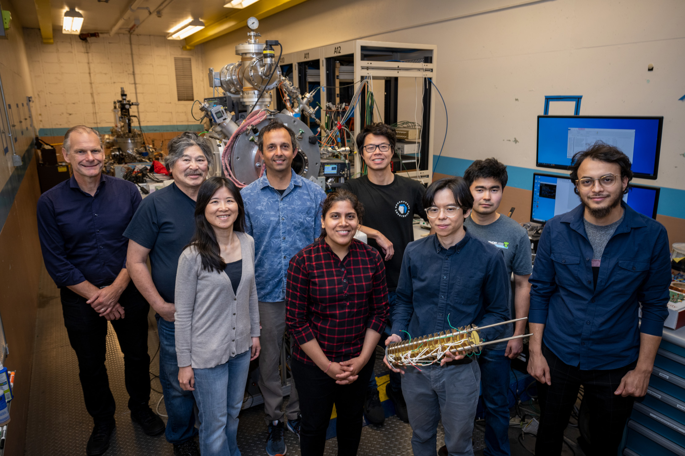 Group photo. (Left to right: Thomas Schenkel, Takeshi Katayanagi, Qing Ji, Arun Persaud, Kaushalya Jhuria, Wei Liu, Liang Tan, Yertay Zhiyenbayev, and Walid Redjem).