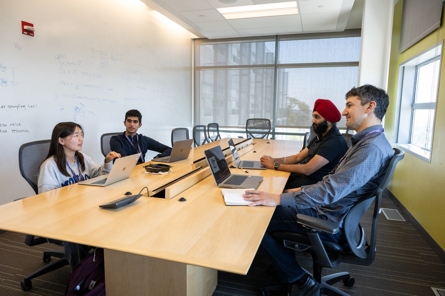 Experience in Research (EinR) Program students Ella Jeon and Sahil Hayak in a meeting with Sartaj Baveja and Chris Tracy of ESnet.