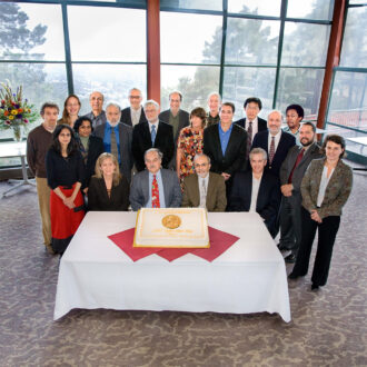 Berkeley Lab employees who contributed to reports by the United Nations' Intergovernmental Panel on Climate Change, which shared the Peace Prize with former Vice President Al Gore, pose for a picture. Image background has been expanded with content-aware fill.