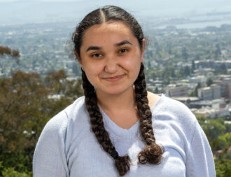 Vivian Owens, a former Experiences in Research intern and Director's Apprenticeship Program participant photographed at the Lab.