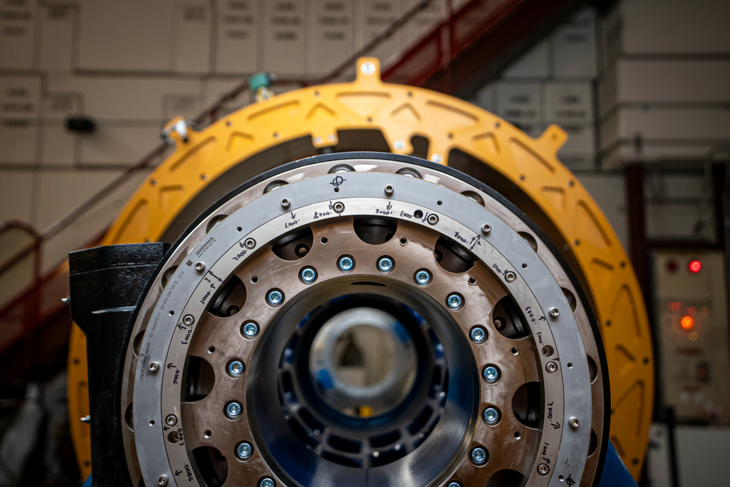 a highly sensitive gamma-ray detector, to be installed at the Facility for Rare Isotope Beams (FRIB). When assembled, the blue metal structures will hold the aluminum sphere in place, and the spheres large, round holes will be filled with crystalline detectors.