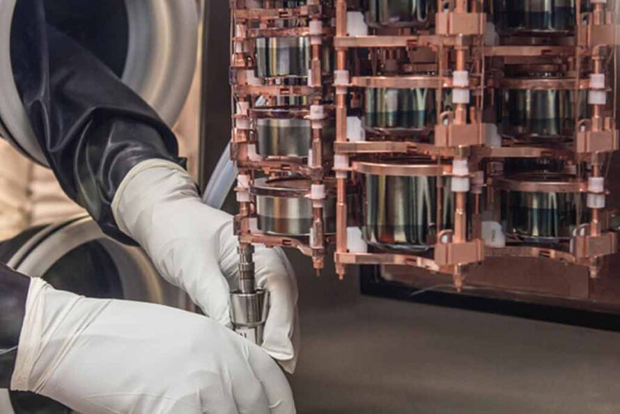 A researcher adjusts a detector deep underground at the Sanford Underground Research Facility