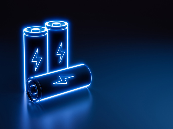 Digital illustration of batteries against a black and dark blue background.