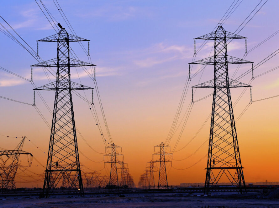 Transmission lines at sunset.