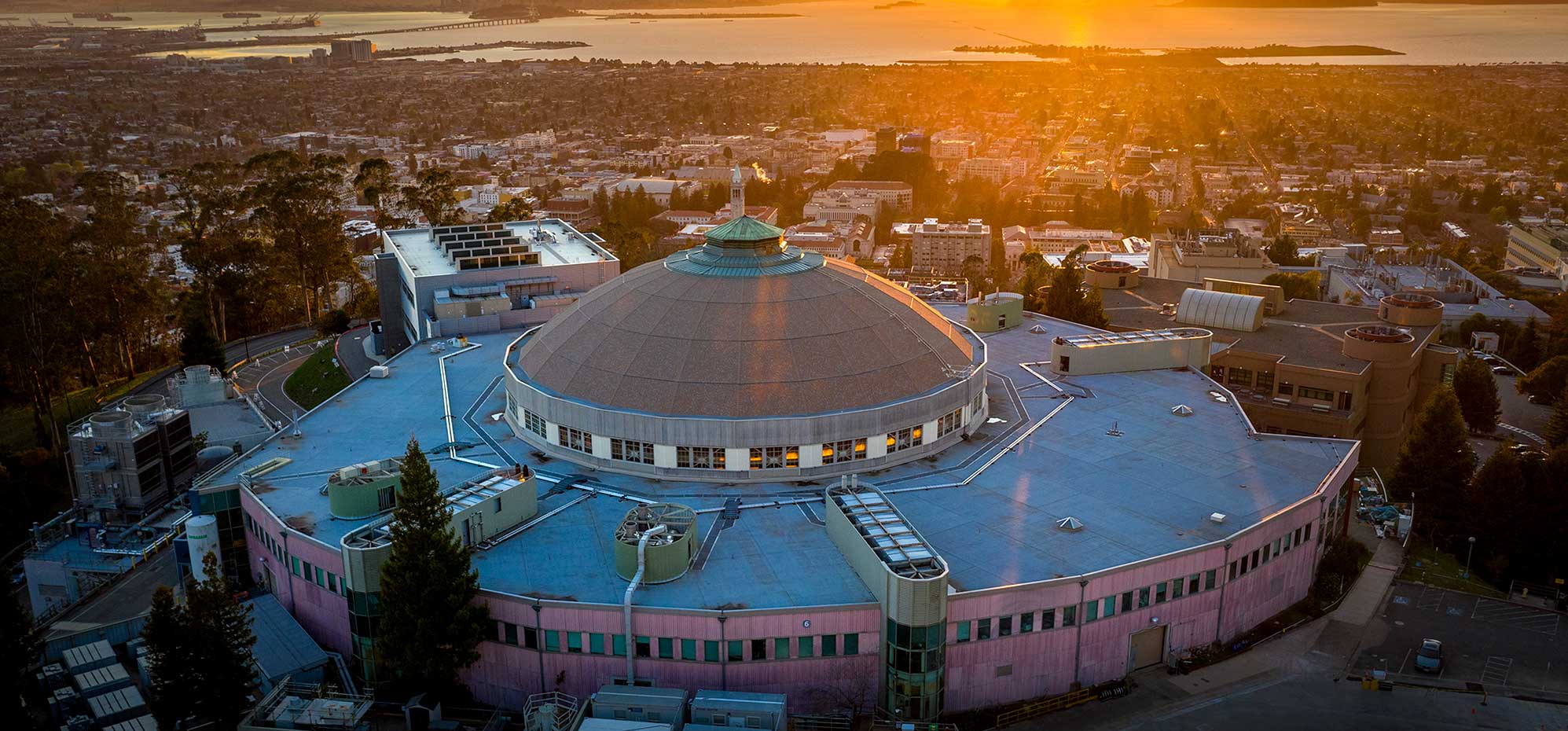 A large domed building at sunset.