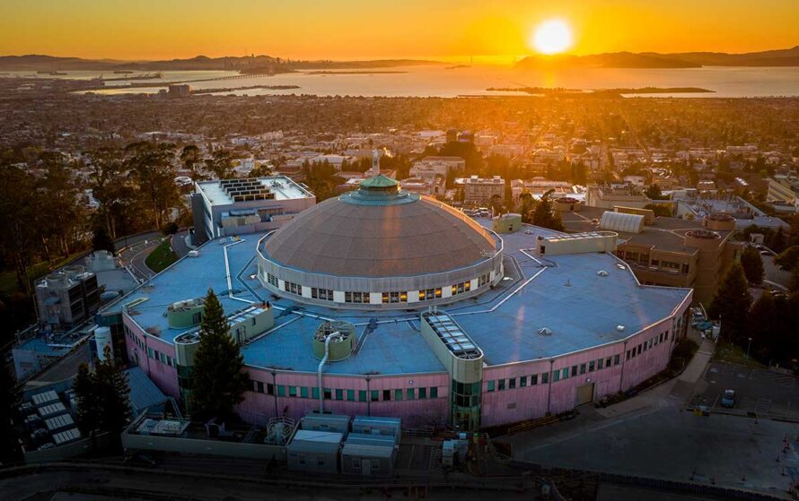 A large domed building at sunset.