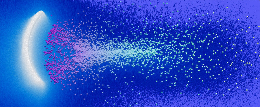 A bright blue and purple fusion simulation of many particles.