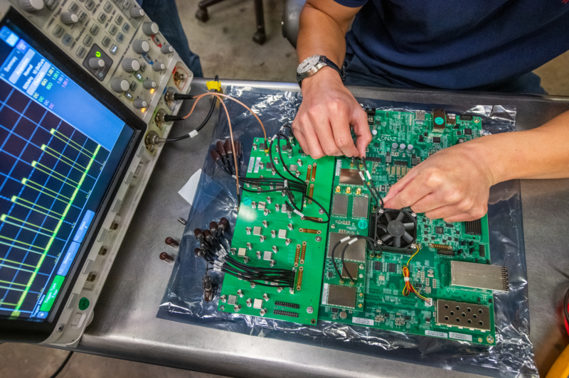 Hands on a circuit board